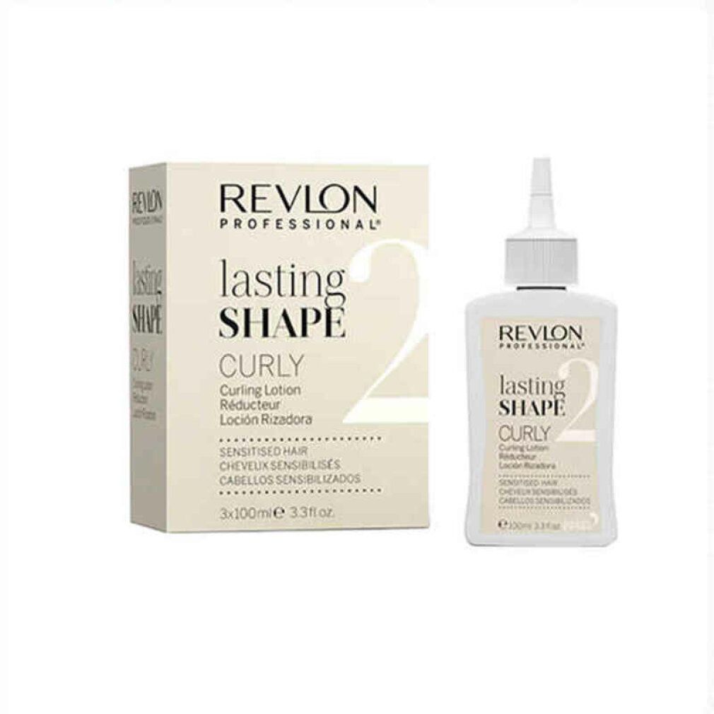 Een fles en een doos Revlon Lasting Shape 2 Curly Lotion. Opschrift: Curly, Gevoelig haar.