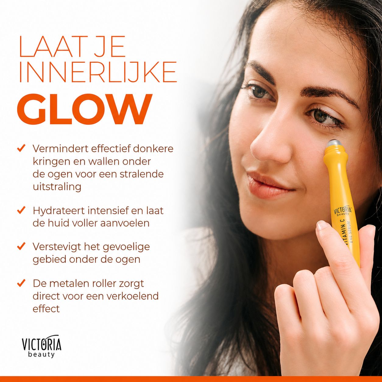 Gele oogrollerfles met metalen roller, vastgehouden door een hand.