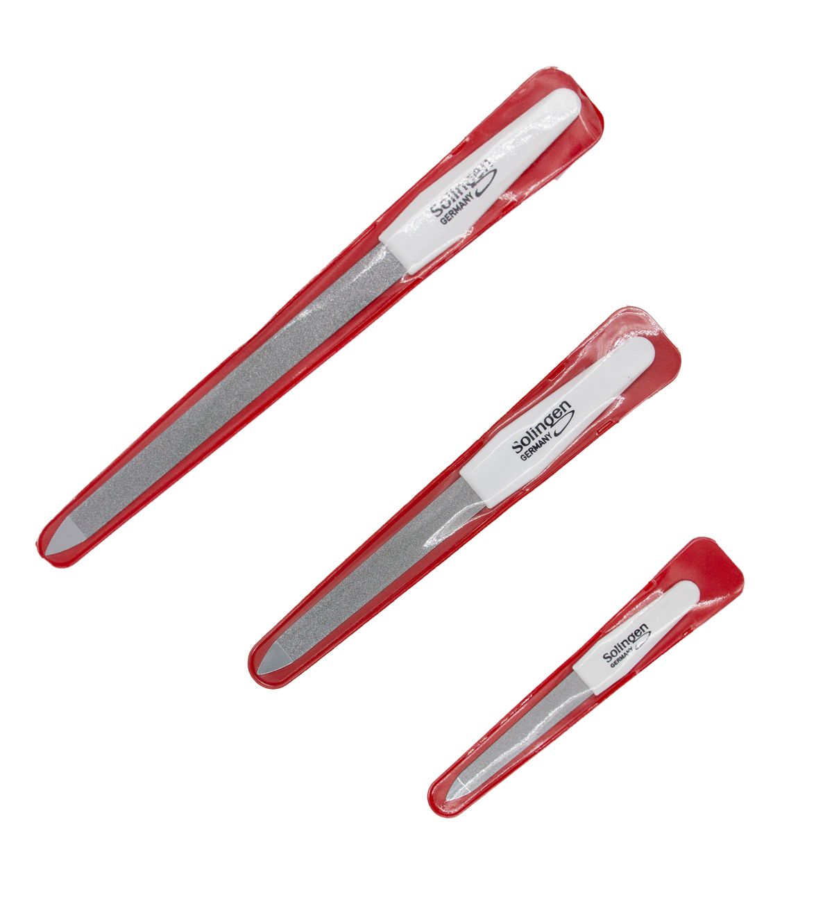 Trois limes à ongles dans étuis rouges. Manche blanc, surface grise. Inscription 'Solingen Germany'.