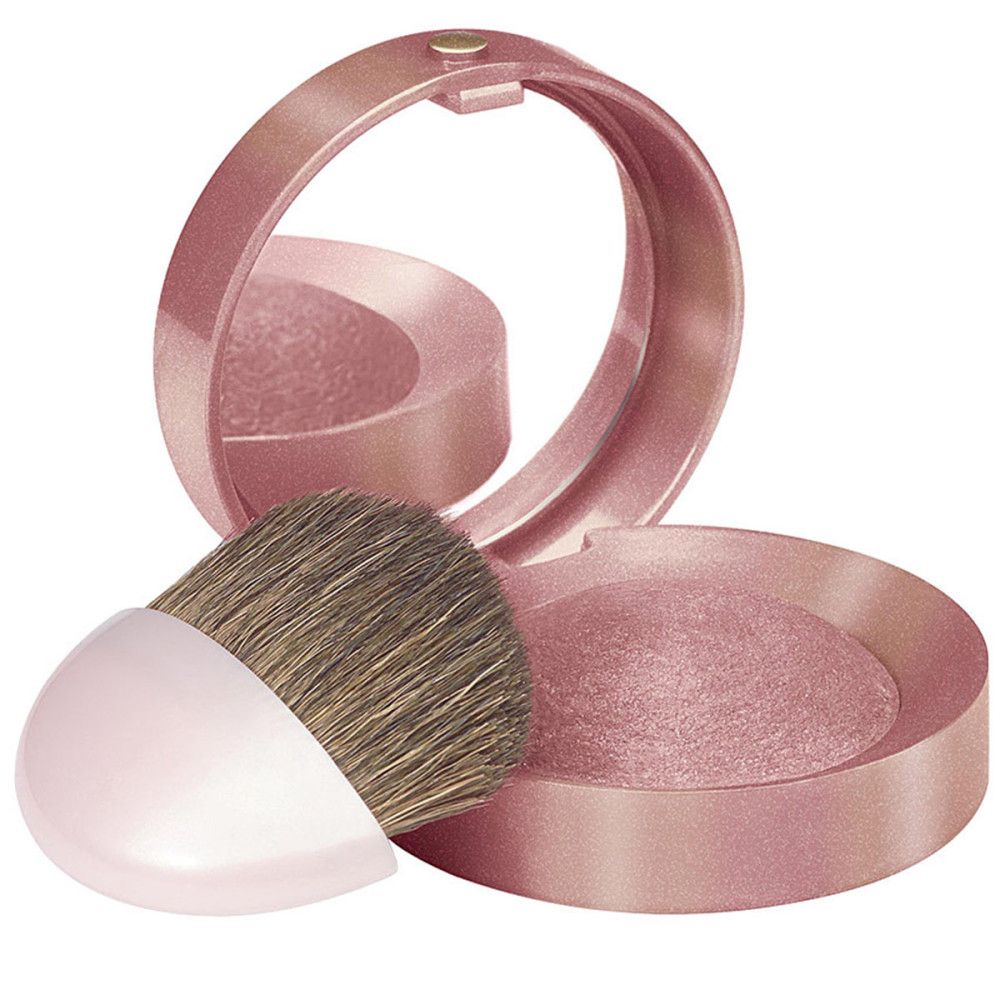 Boîtier rose avec miroir et pinceau. Rouge et pinceau visibles.
