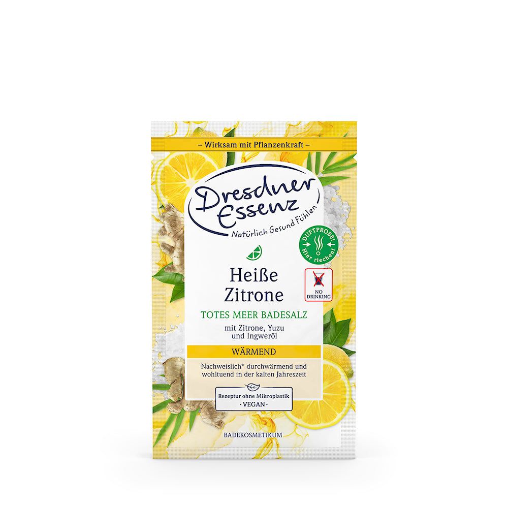 Verpakking van Dresdner Essenz badzout. Opschrift: Heiße Zitrone, Totes Meer Badesalz. Met citroen, yuzu en gember. Vegan.