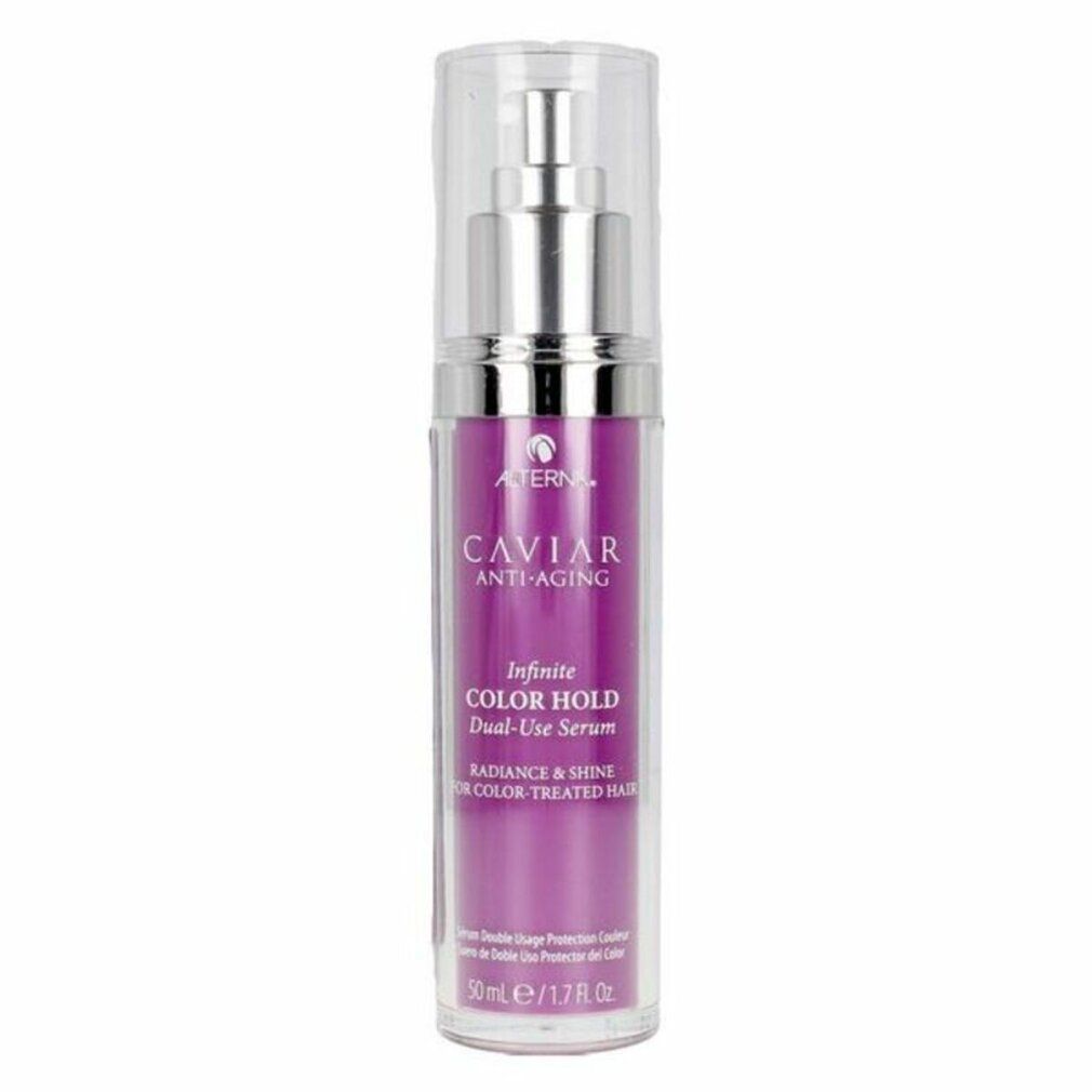Serumfles met zilveren pomp en paarse vloeistof. Opschrift: Caviar Anti-Aging, Infinite Color Hold Dual-Use Serum.