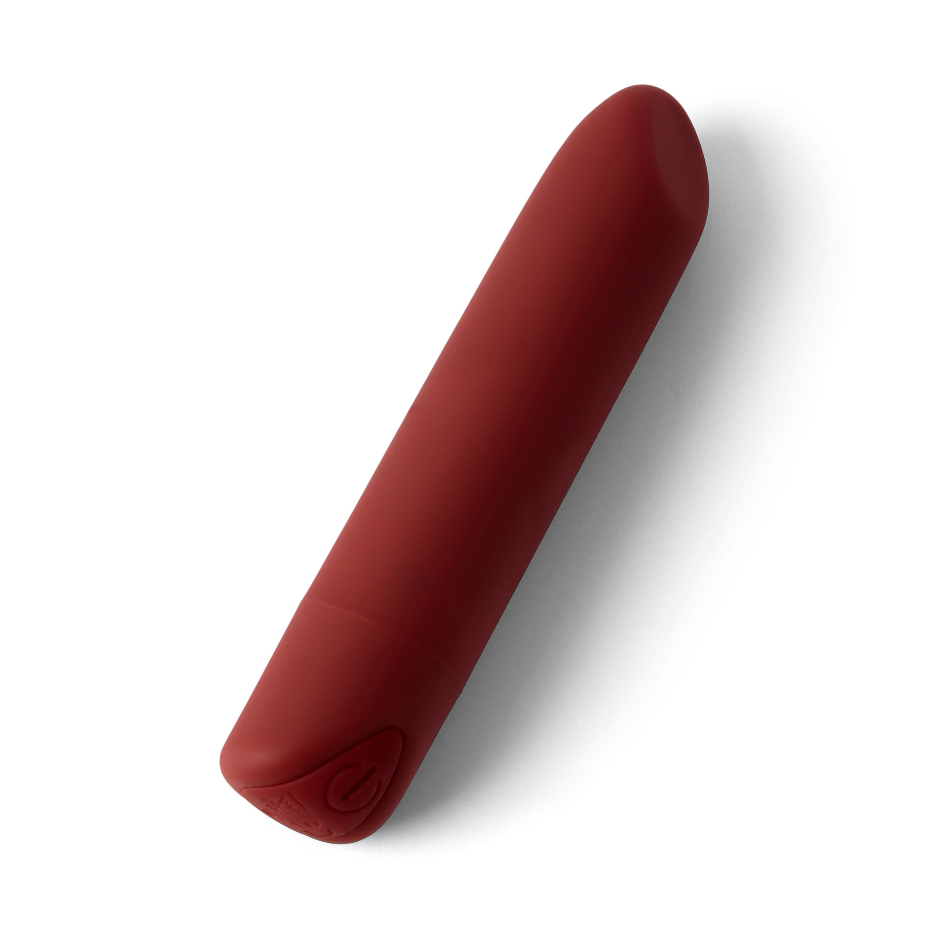 Objet allongé rouge, extrémités arrondies. Panneau de commande avec symbole à une extrémité. Sur fond blanc.