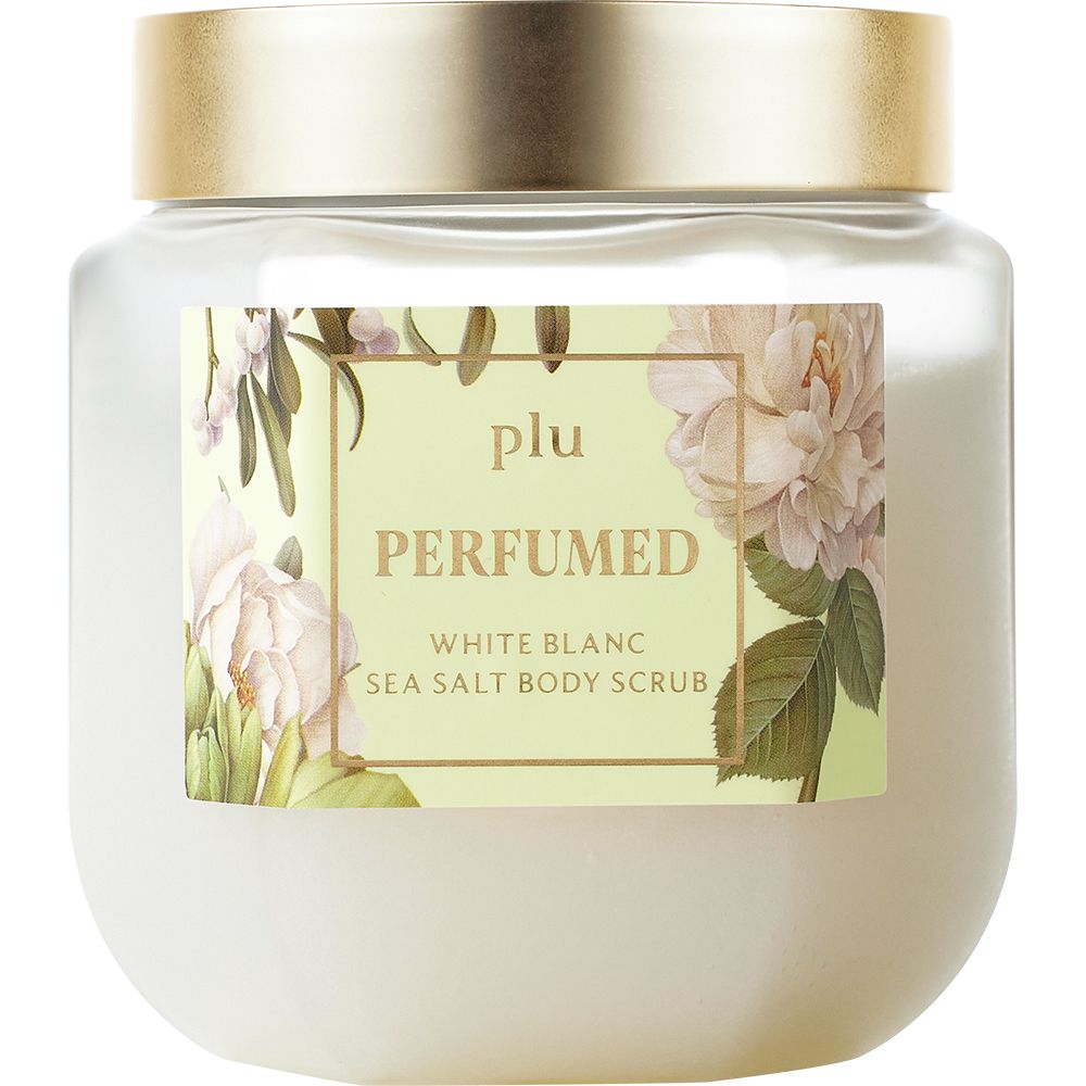 Pot en verre avec couvercle doré. Étiquette avec motif floral et nom du produit : PERFUMED White Blanc Sea Salt Body Scrub.