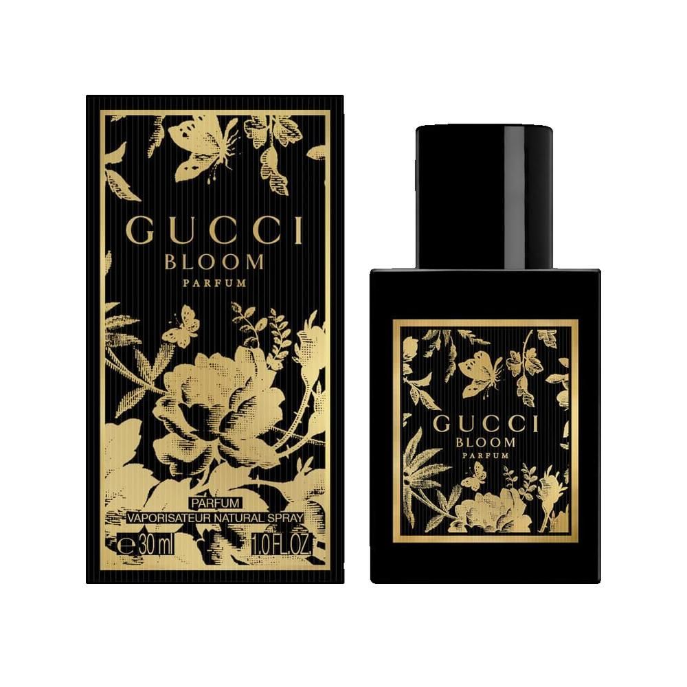 Zwarte flacon en doos. Opschrift: Gucci Bloom Parfum. Gouden versieringen. Flacon met zwarte dop.