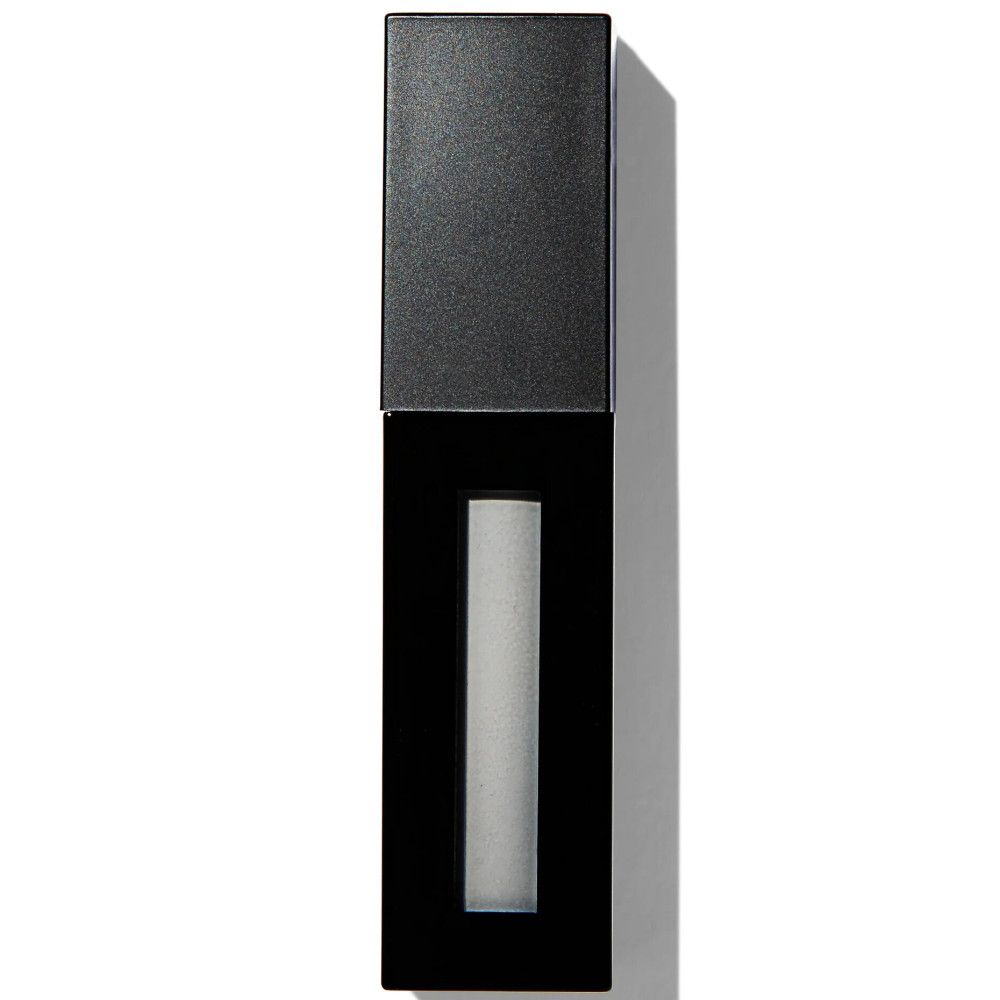 Flacon de gloss noir rectangulaire fermé. Contenu blanc visible à travers la fenêtre transparente.