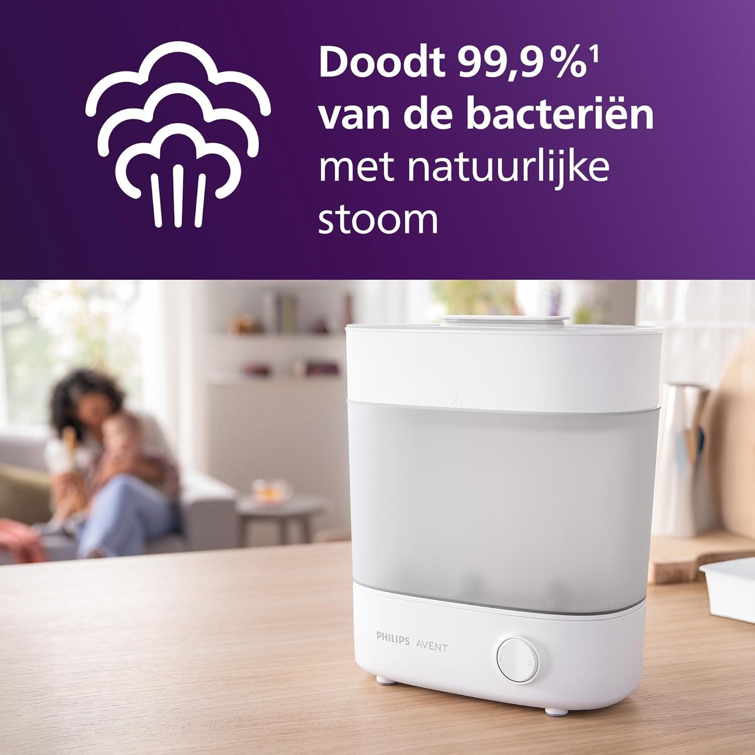 Philips Avent sterilisator op een aanrecht, met een paarse cirkel die '99,9%' aangeeft.