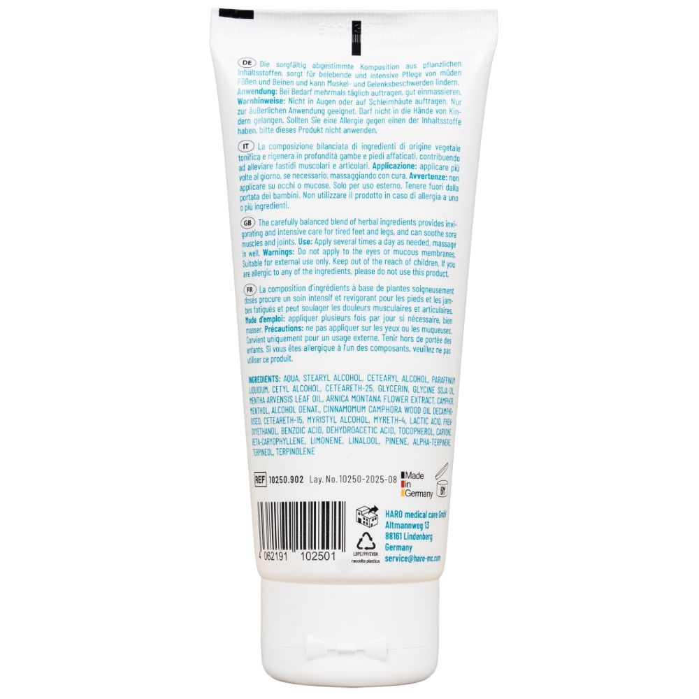 Dos d'un tube blanc. Texte: Ingrédients, instructions d'utilisation, informations fabricant. Fabriqué en Allemagne.