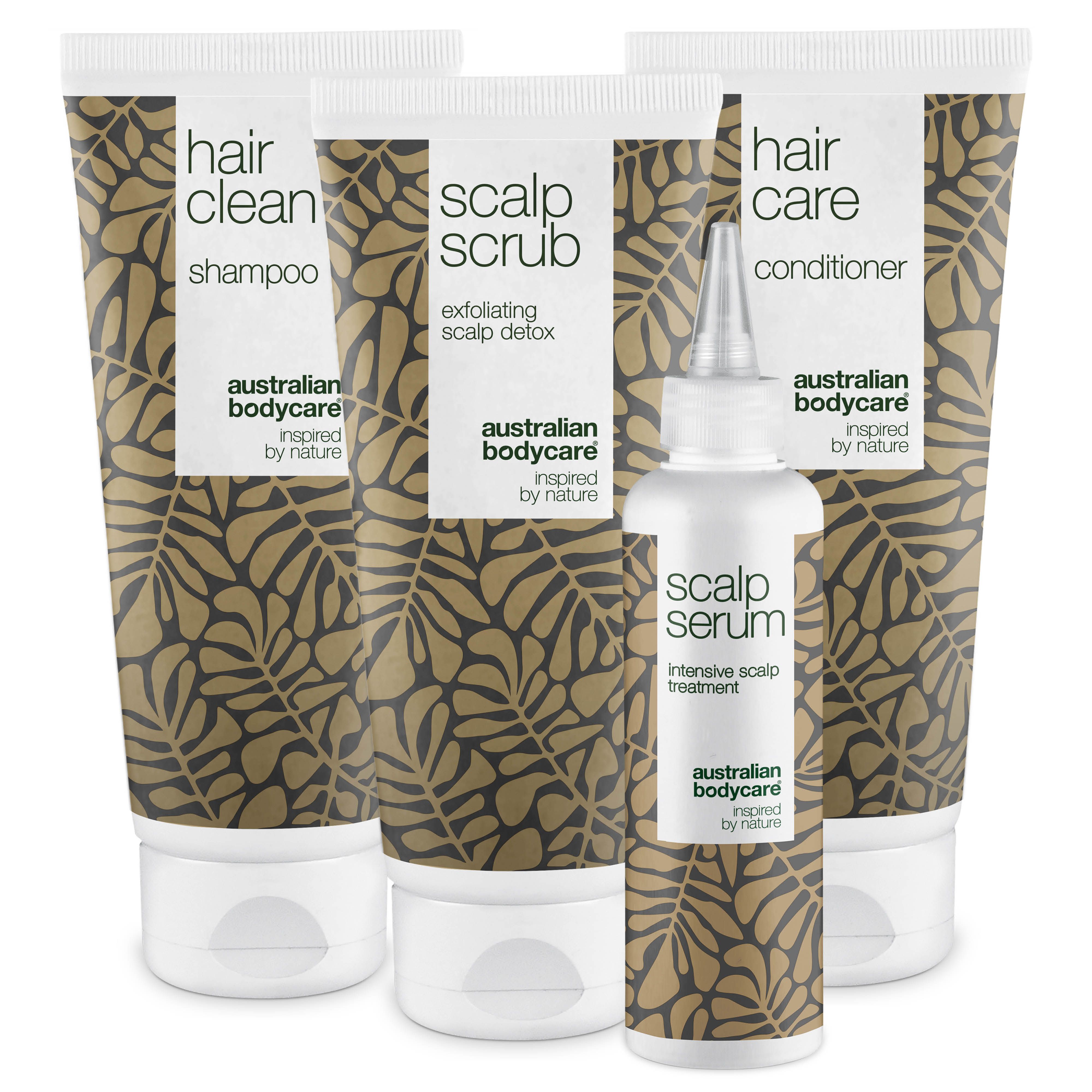 Quatre produits : shampooing, gommage du cuir chevelu, revitalisant et sérum. Tous en tubes et flacons à motifs de feuilles.