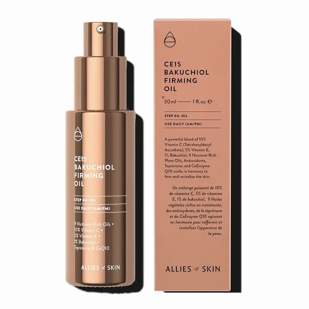 Oliefles en verpakking. Productnaam en ingrediënten zichtbaar. Op witte achtergrond.