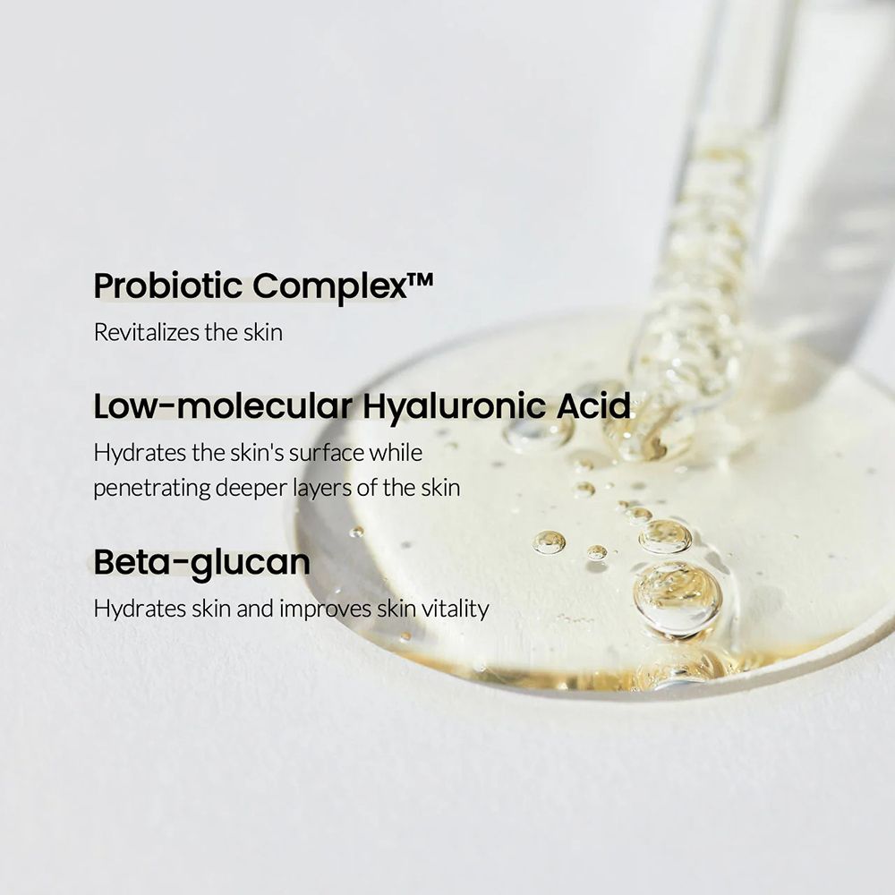 Gros plan sur des gouttes de sérum. Texte: Probiotic Complex, Low-molecular Hyaluronic Acid, Beta-glucan.