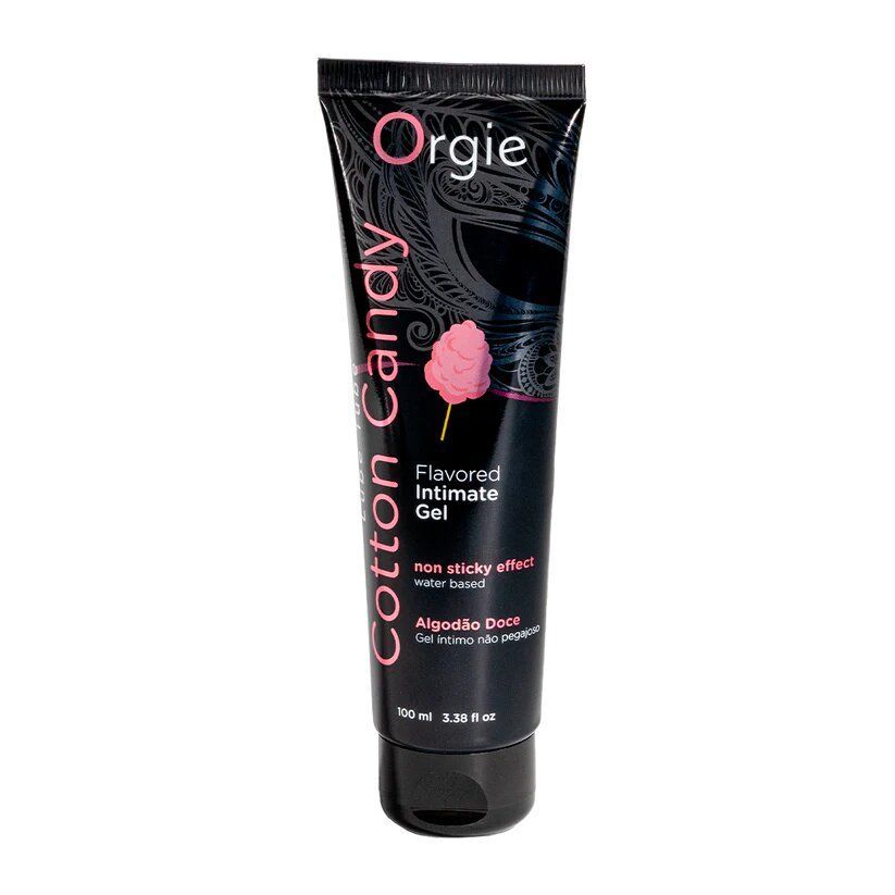 Zwarte tube met "Cotton Candy" en "Orgie". Roze tekst en logo. 100 ml.