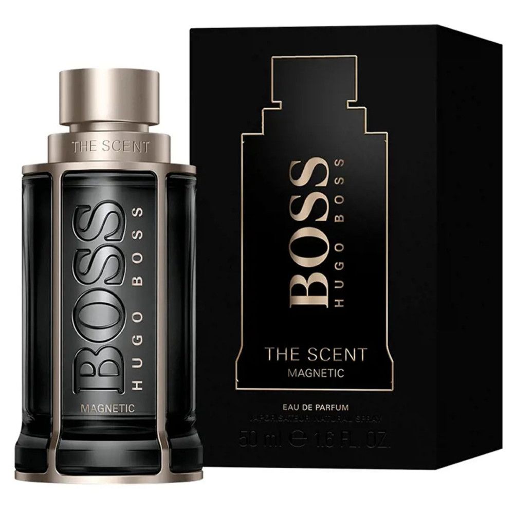 Flacon noir à côté d'un emballage noir. "BOSS" et "MAGNETIC" visibles sur les deux. "HUGO BOSS" et "THE SCENT" sont également visibles.