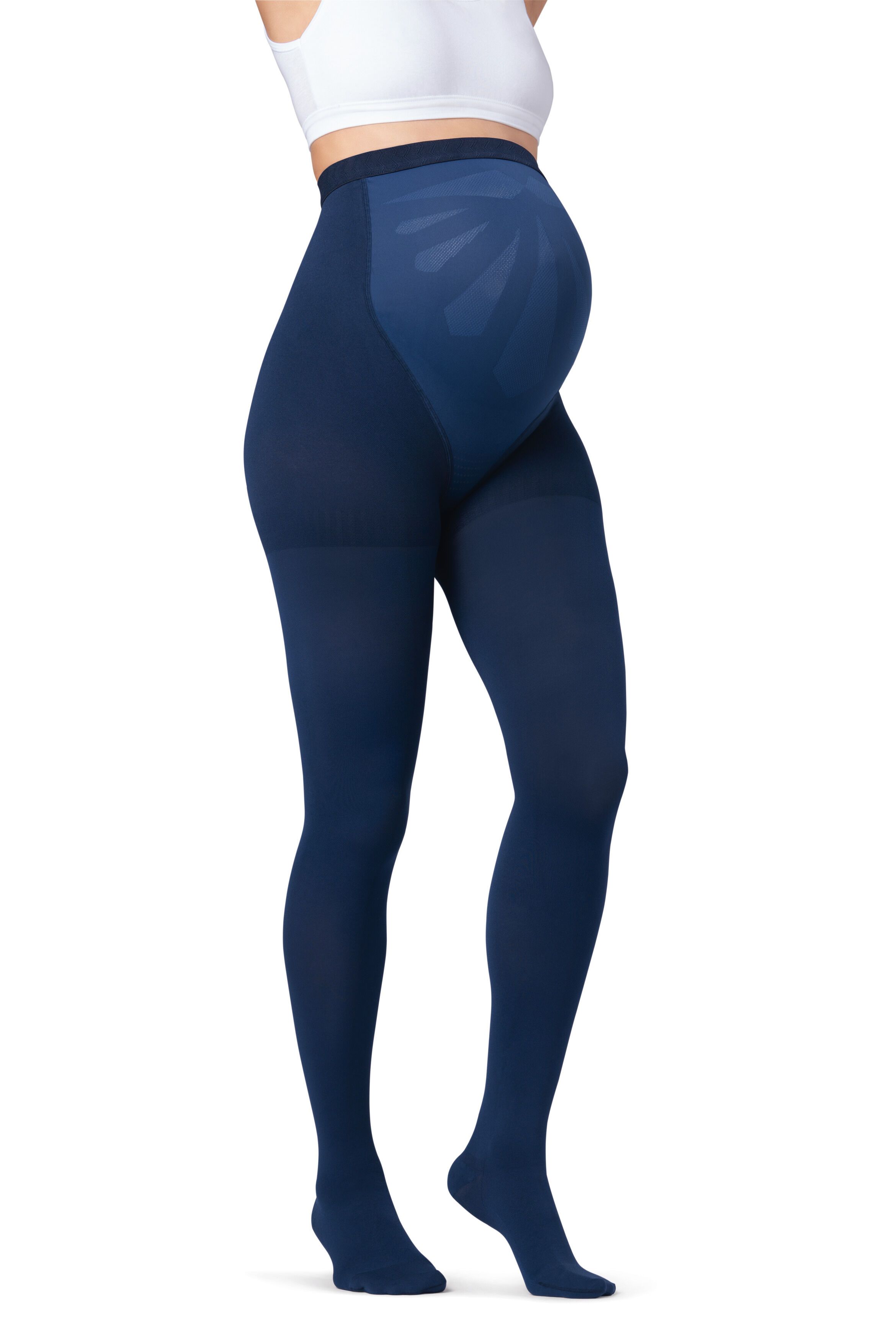 Collant de compression bleu marine pour femmes enceintes. Motif sur le ventre. Vue latérale d'une femme portant le collant et un haut blanc.