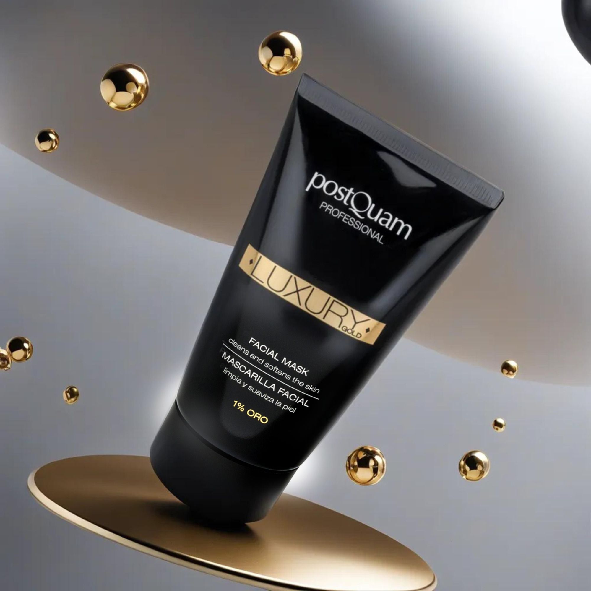 Zwarte tube met gouden tekst. Postquam Professional, Luxury Gold, Facial Mask, 1% Oro. Product op gouden platform.