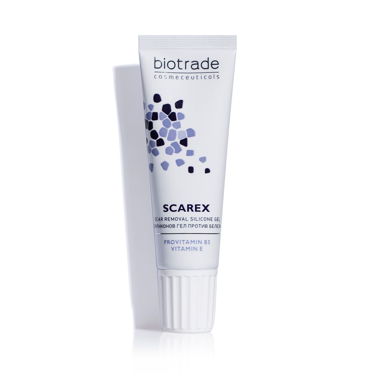 Witte tube met productnaam en logo, op witte achtergrond, schaduw links.