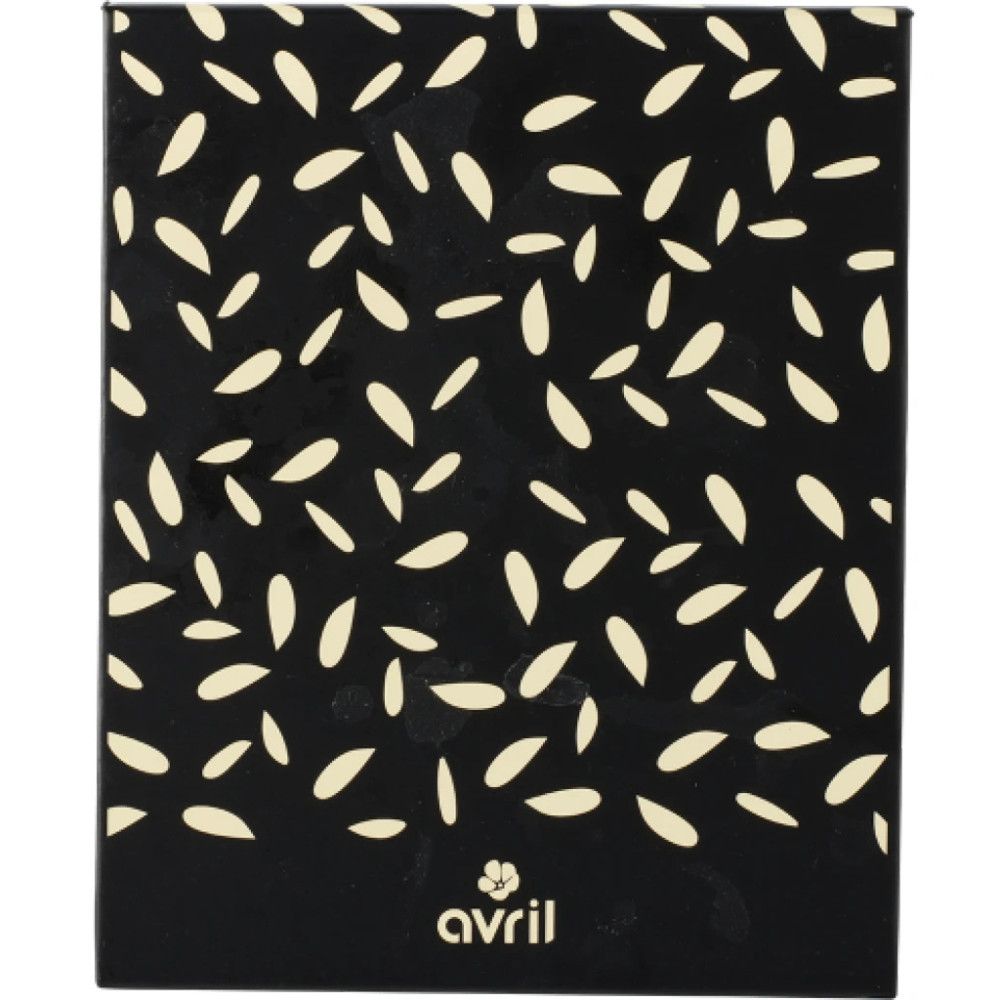 Emballage noir avec motif de feuilles blanches. Logo Avril en bas. Forme rectangulaire.