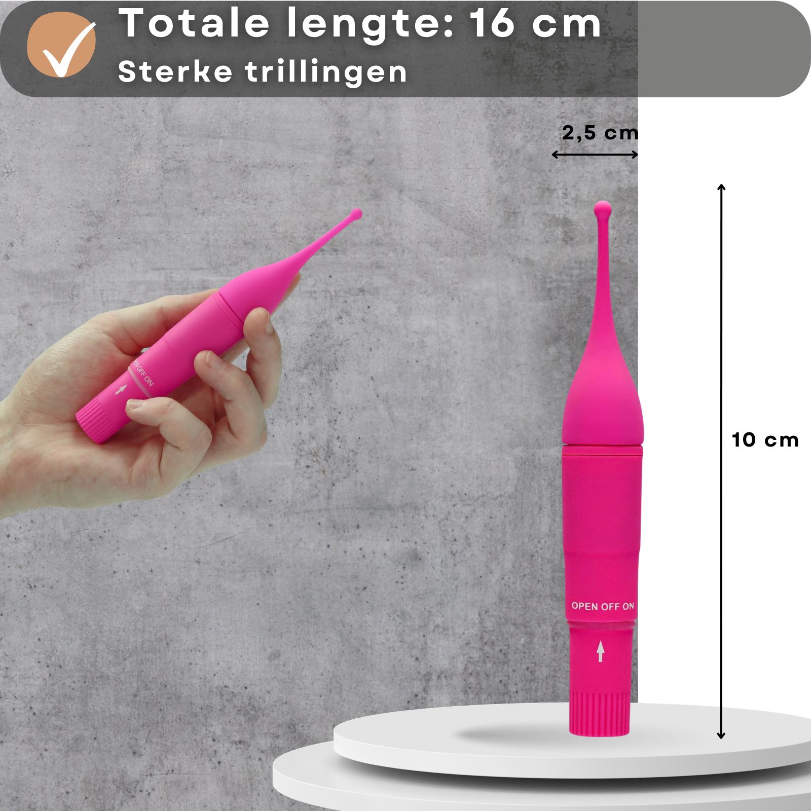 Roze vibrator en hand. Afmetingen: 10 cm hoog, 2,5 cm breed. Tekst: Totale lengte 16 cm.