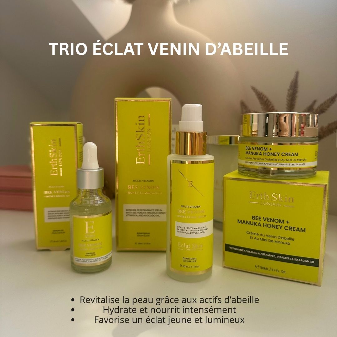 ErthSkin-trio met serum, crème en olie. Gele verpakking met tekst. Producten geplaatst op gele dozen.