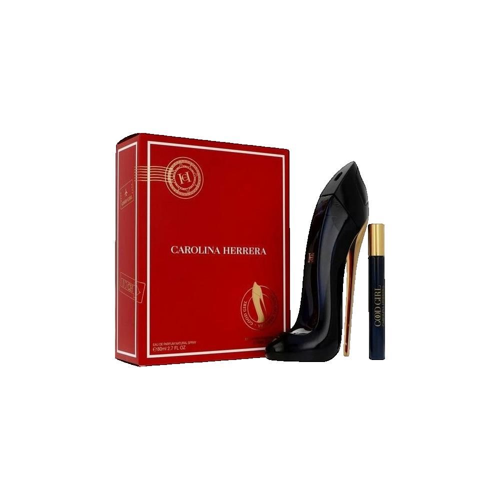 Rode geschenkverpakking, zwarte pumps-fles en miniatuurfles. Opschrift: CAROLINA HERRERA.