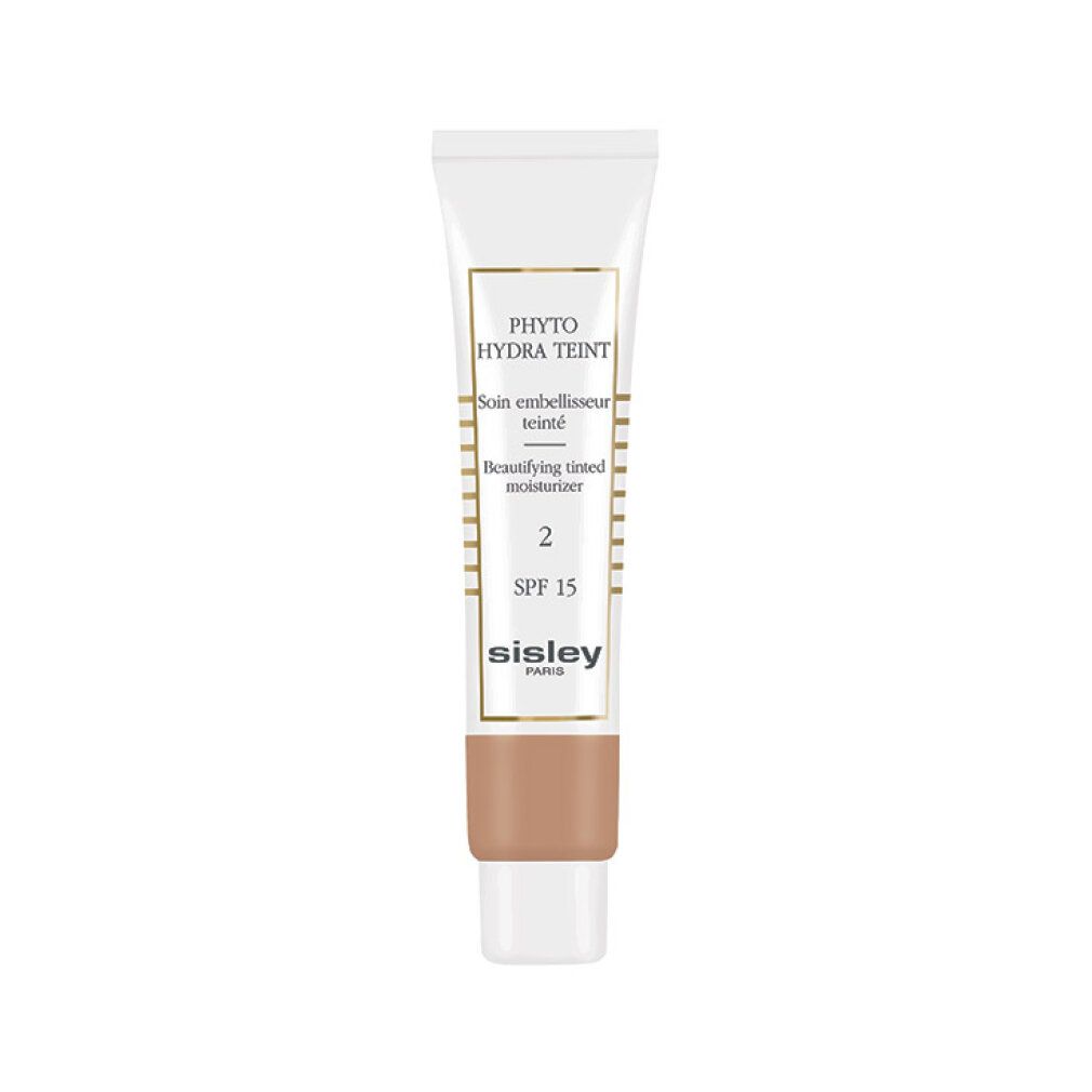 Tube Sisley Phyto-Hydra Teint, teinte 2, SPF 15. Tube blanc avec détails dorés et nom du produit. Partie inférieure couleur peau.