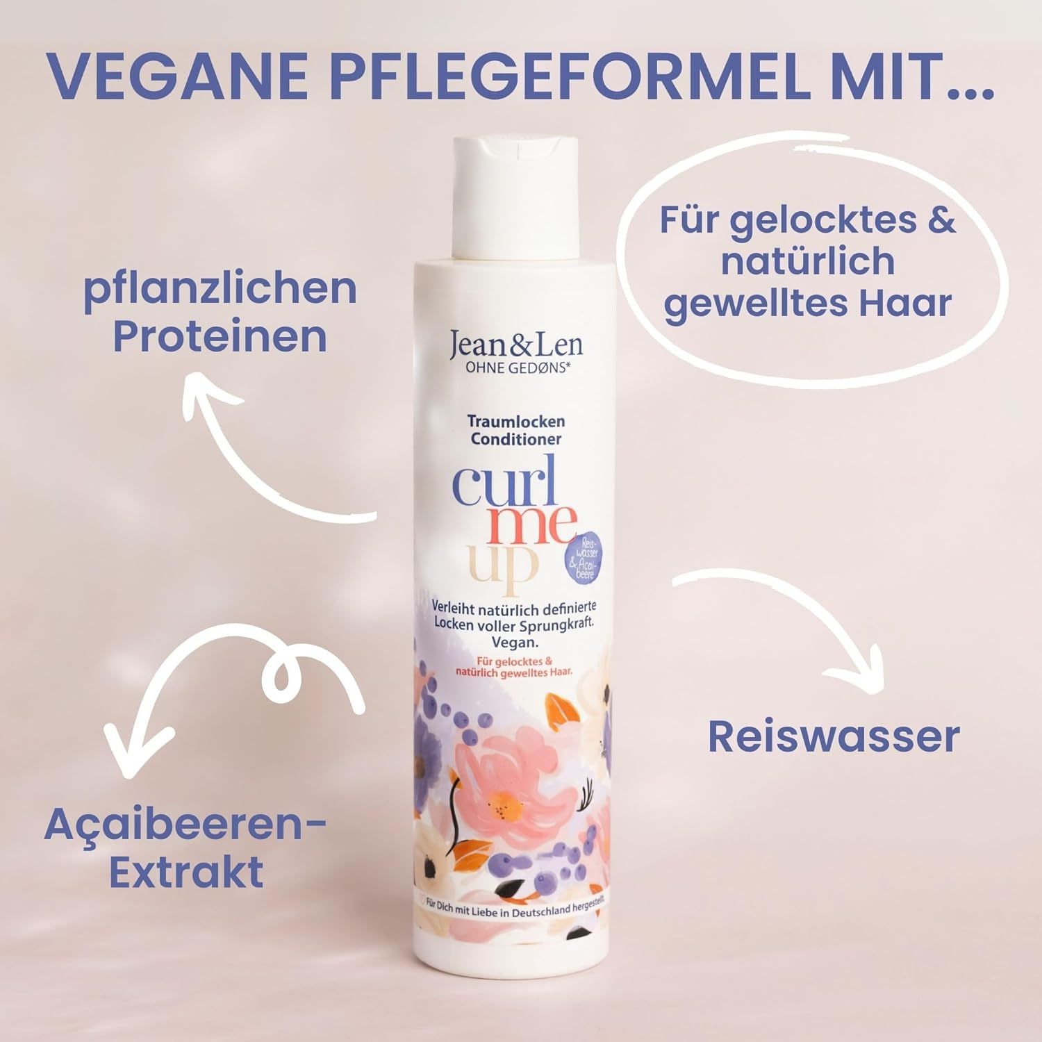 Bouteille de revitalisant Jean & Len Traumlocken. Texte : Formule végétalienne avec protéines végétales, eau de riz et extrait d'açaï.