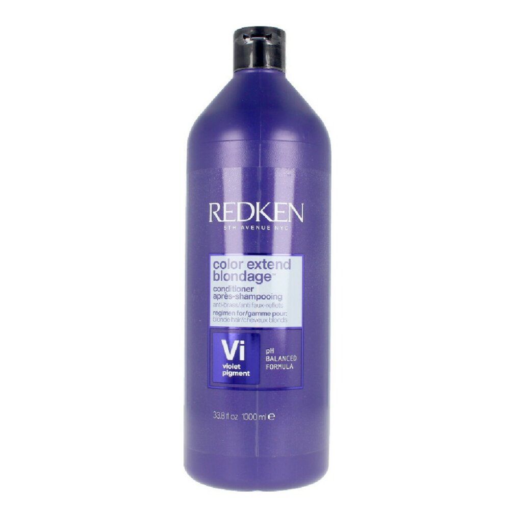 Violette conditioner van Redken. Fles met zwarte dop. Productlabel met tekst.
