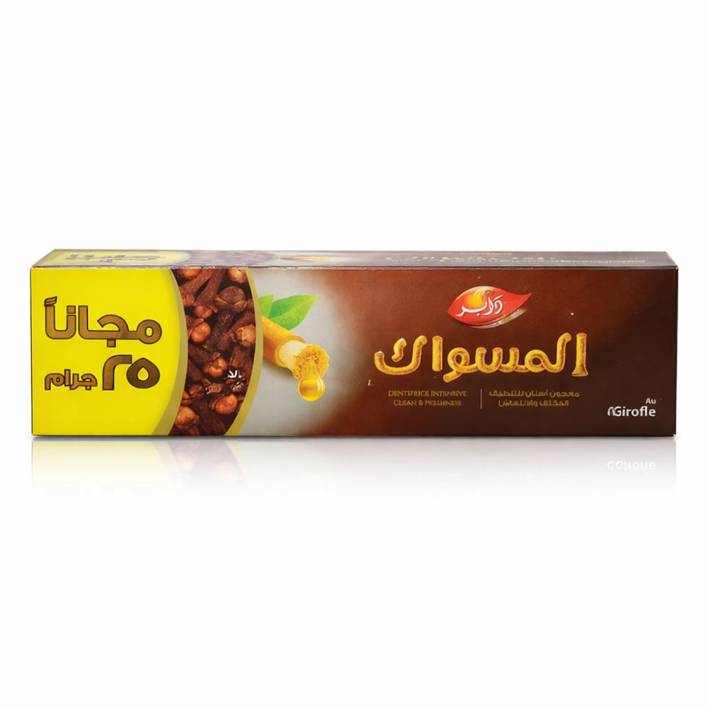 Tandpastadoos, bruin, geel en wit. Arabische tekst. Illustraties van kruidnagel en miswak. "Girofle"-logo.