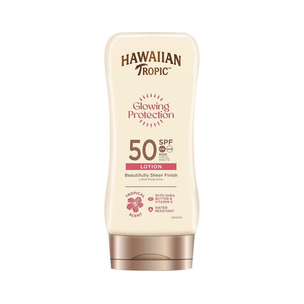 Flacon de lotion solaire avec l'inscription : Hawaiian Tropic Glowing Protection SPF 50. Avec beurre de karité et vitamine E.
