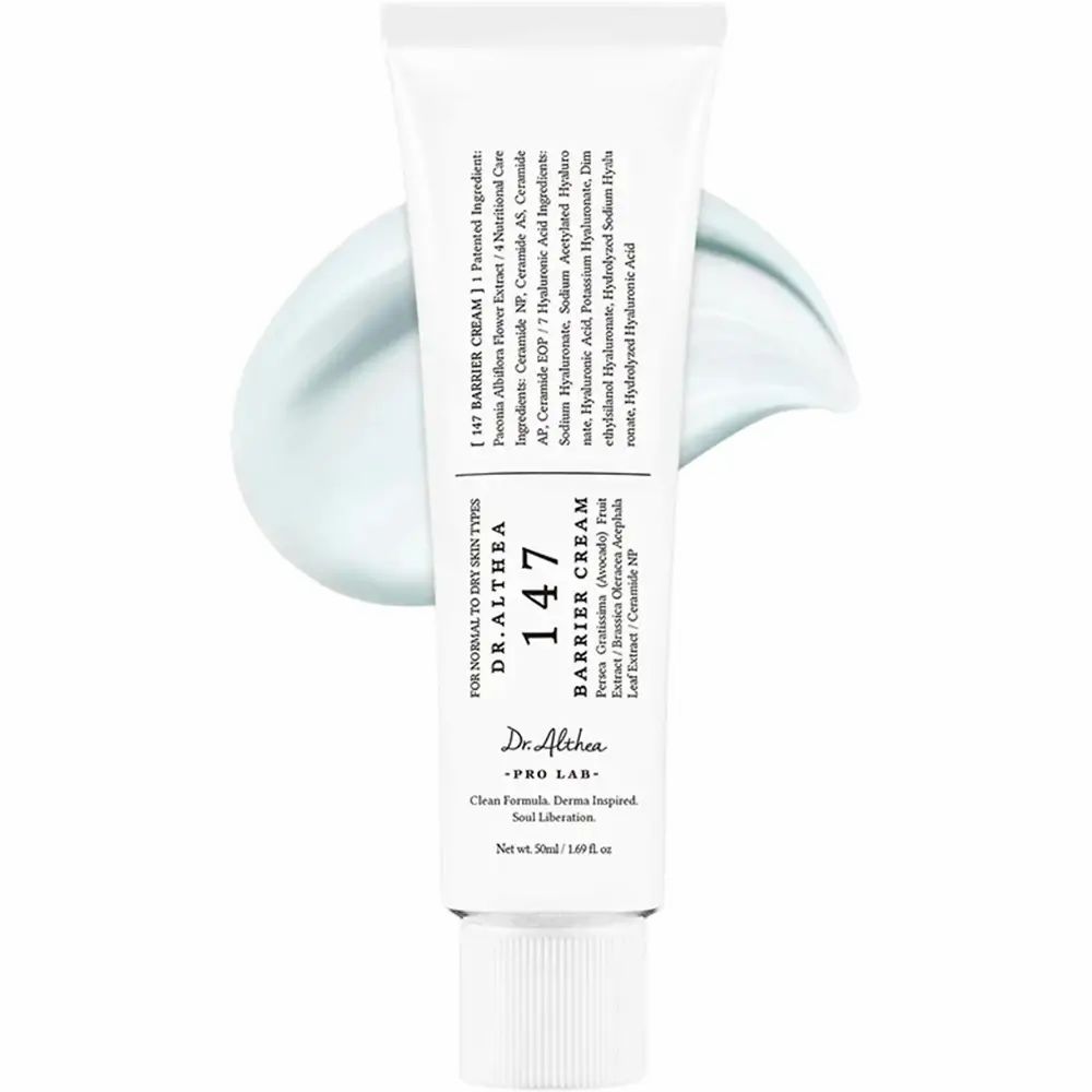 Tube blanc de crème, avec un trait de produit. Inscription: 147 Barrier Cream, Dr. Althea. Pour peaux sèches.