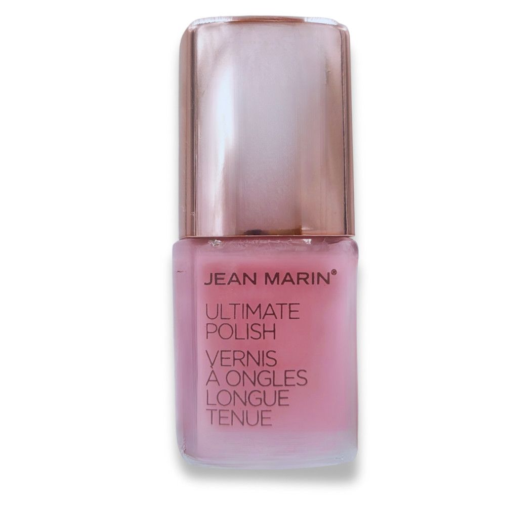 Flacon de vernis à ongles. Jean Marin Ultimate Polish. Couleur rose. Bouchon or rose. Texte: Vernis à ongles longue tenue.
