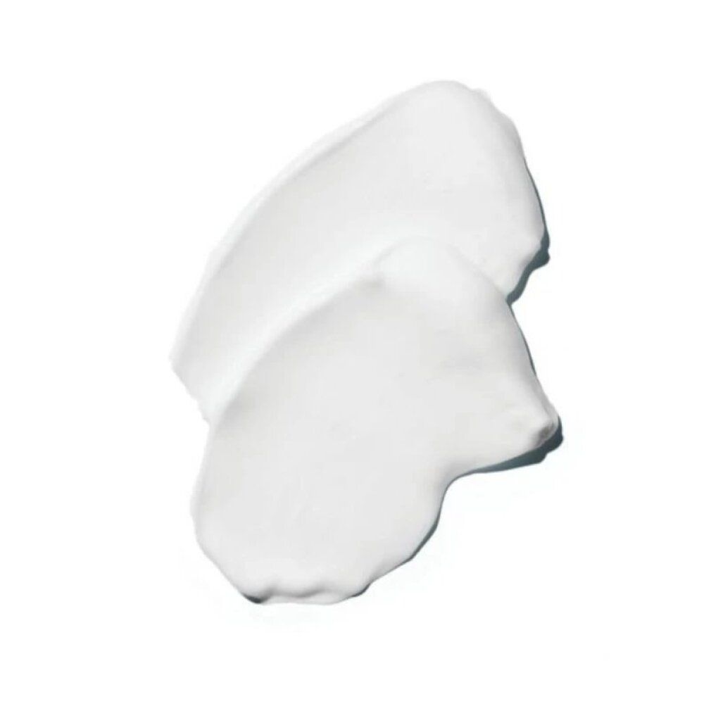 Deux noisettes de crème blanche sur fond blanc. Aucune inscription visible.