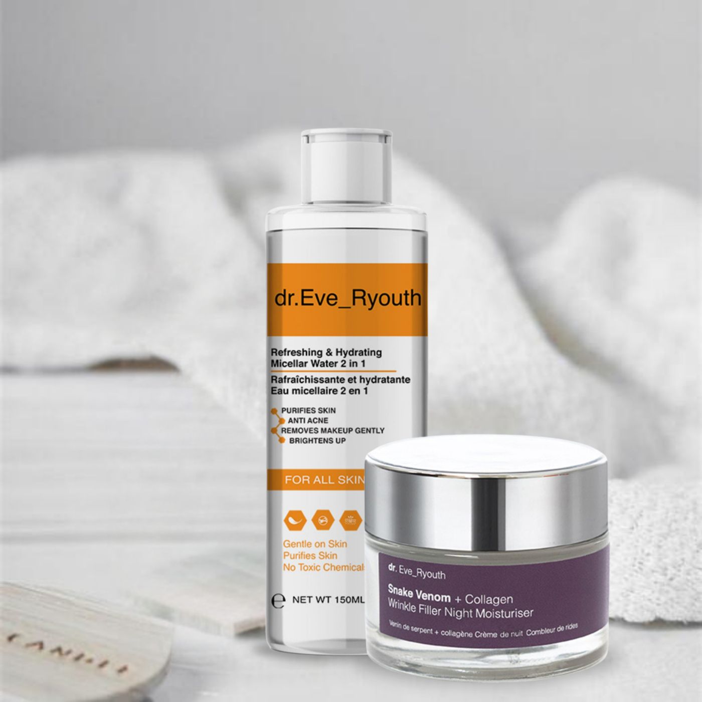 Ensemble de lotion micellaire et de crème de nuit anti-âge Dr. Eve_Ryouth sur une serviette.