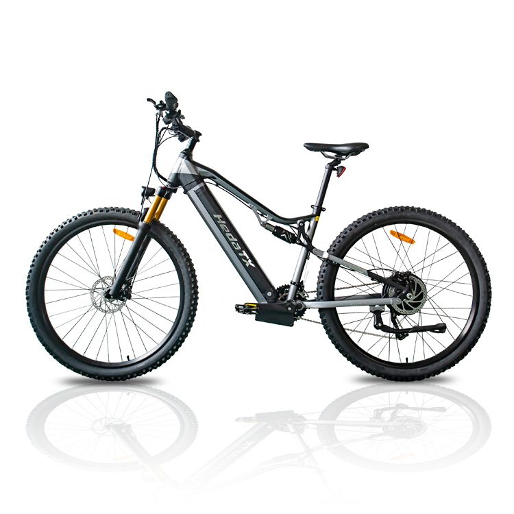 VTT électrique HedaTX TX19. Cadre noir et gris, pneus noirs. Éléments de suspension jaunes. Vue latérale, fond blanc.