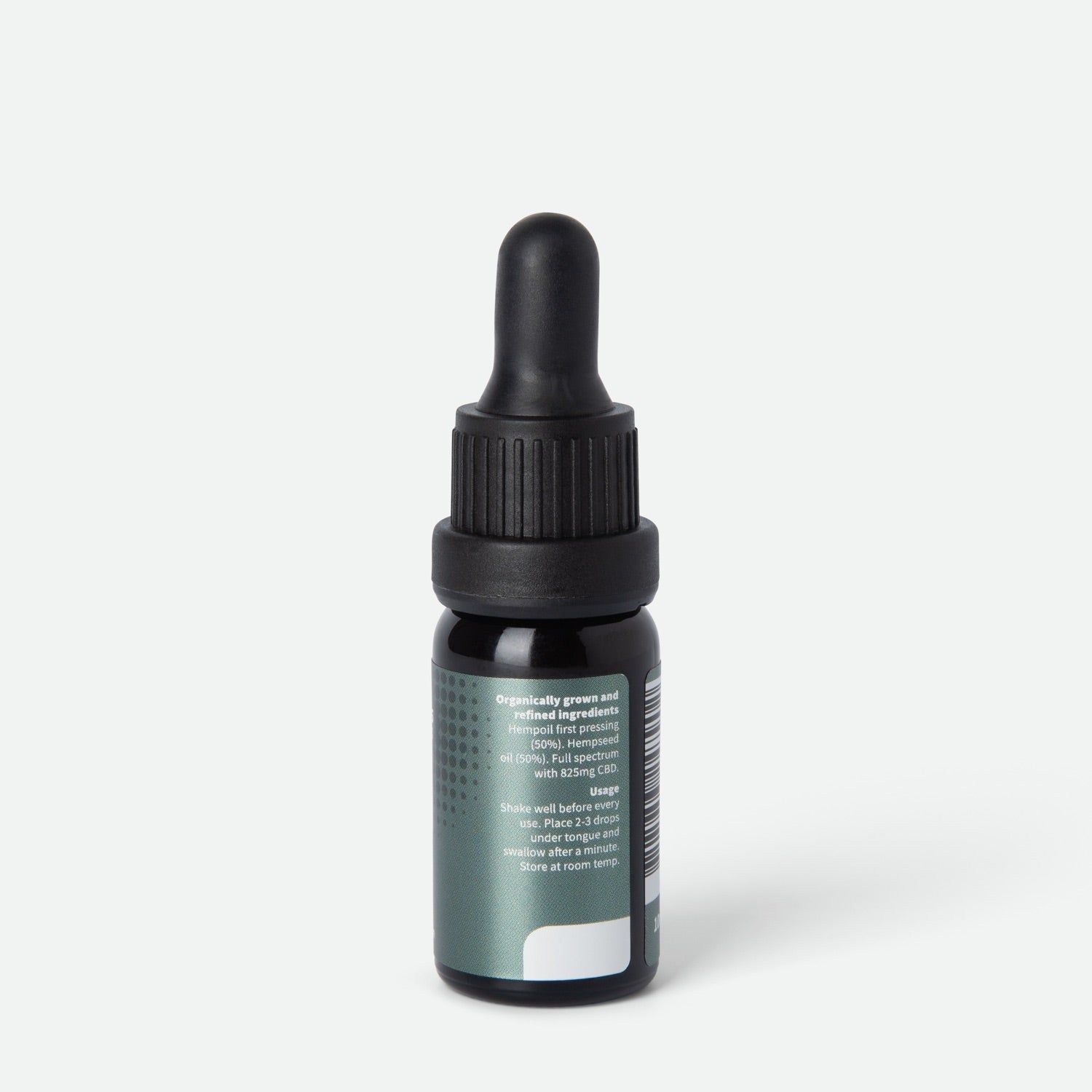 Vue arrière d'un flacon en verre brun avec compte-gouttes noir. Étiquette avec texte sur les ingrédients et l'utilisation.