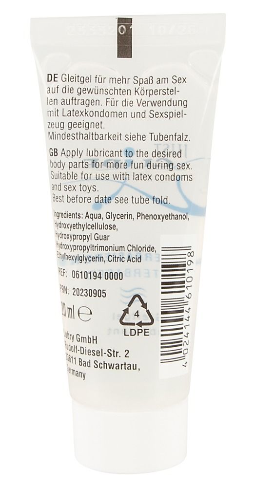 Dos du tube. Texte multilingue. Ingrédients, instructions d'utilisation, numéro de lot, marquage CE.
