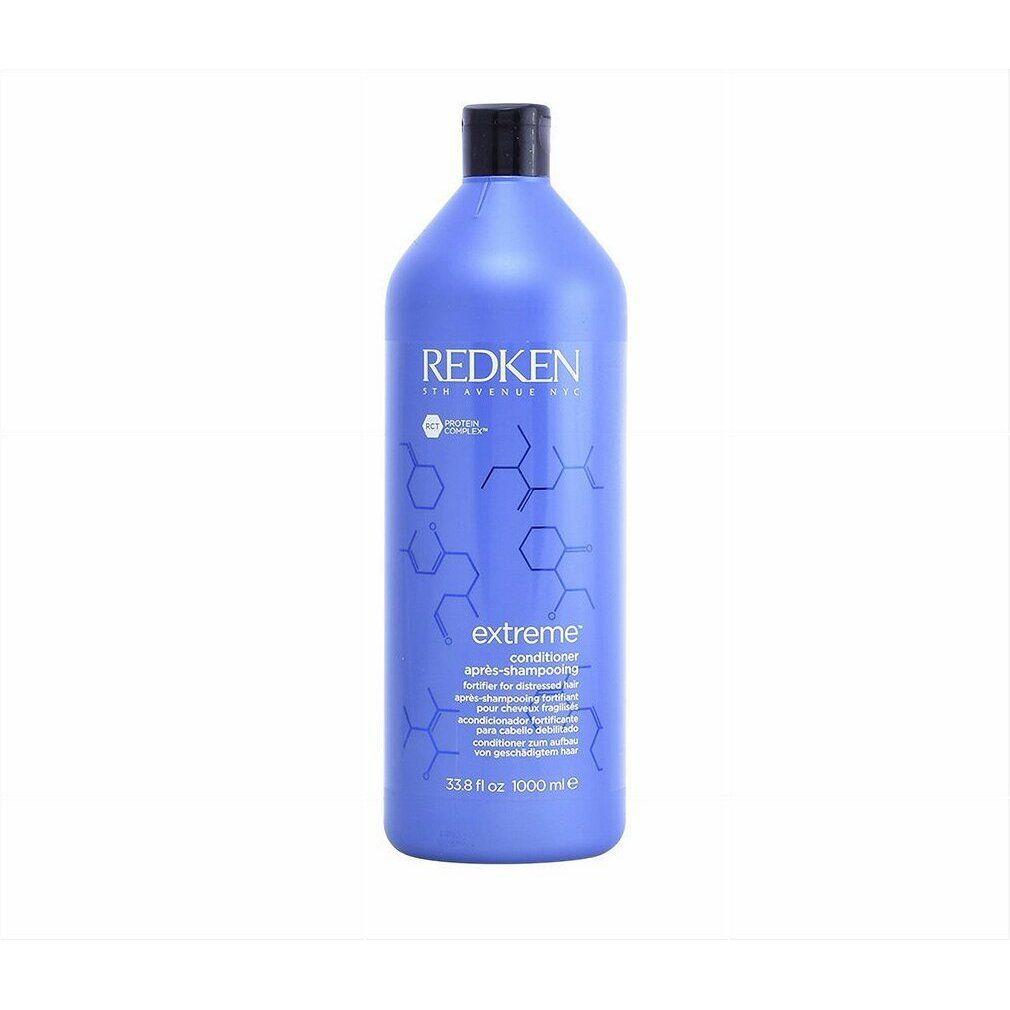 Flacon bleu Redken Extreme Conditioner. Bouchon noir. Texte: Extreme, Conditioner, 33.8 fl oz, 1000 ml.