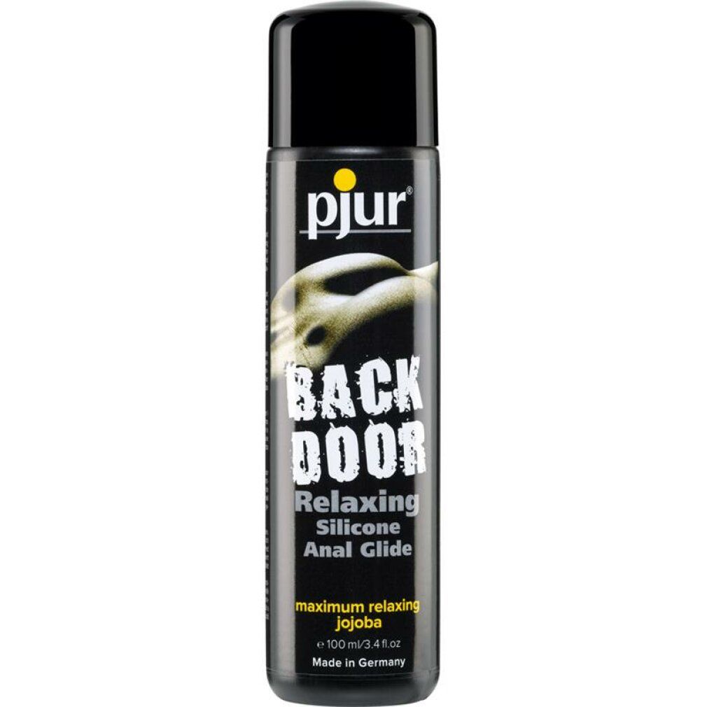 Zwarte fles met geel logo. Opschrift: BACK DOOR Relaxing Silicone Anal Glide. Met jojoba. 100 ml. Gemaakt in Duitsland.
