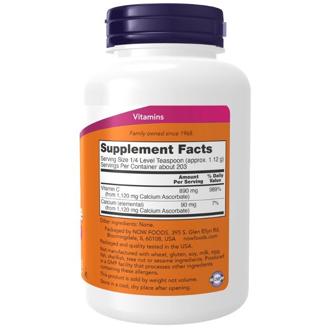 Witte pot met paarse deksel. Etiket met voedingswaarde en vitamine C. NOW FOODS logo en tekst.