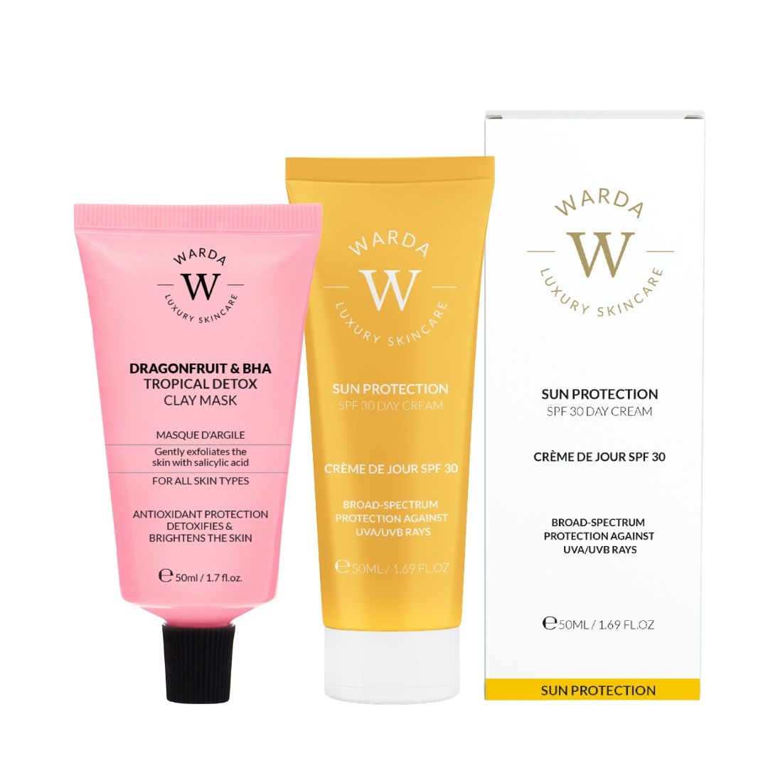 Trois produits cosmétiques : tube rose, tube jaune et boîte blanche. Inscription : Warda Luxury Skincare, Sun Protection, SPF 30 Day Cream.