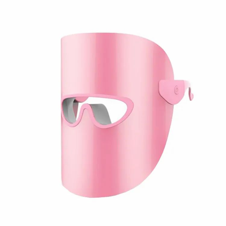 Roze LED-lichttherapiemasker. Vorm: Masker met oogsleuf. Knop aan de zijkant.