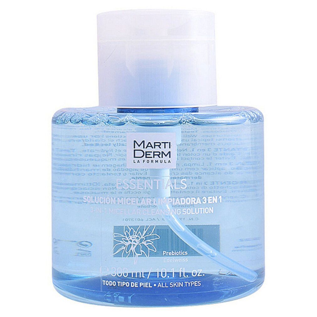 Blauwe transparante fles met witte dop. Opschrift: Marti Derm Essentials, Solución Micelar 3 en 1. Met pomp.