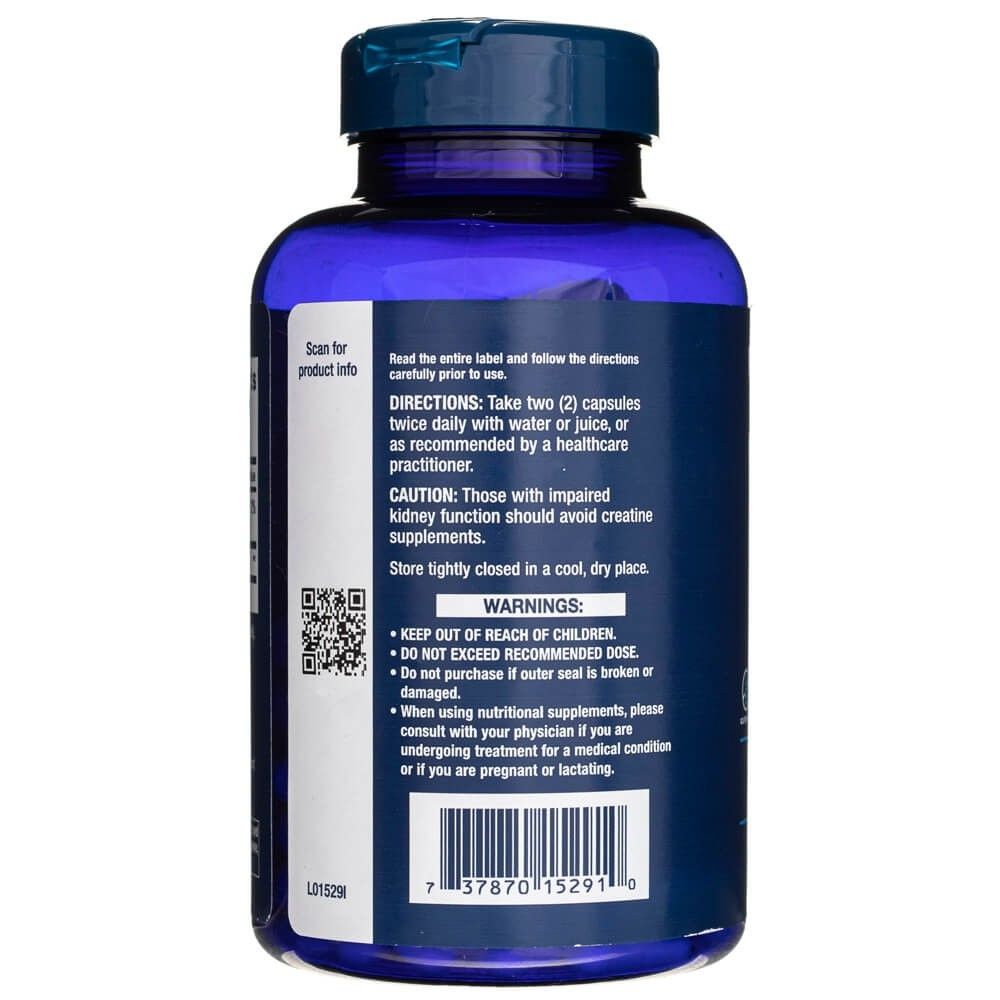 Dos du flacon Life Extension Kreatin-Kapseln. Contient les instructions d'utilisation et les avertissements. QR code pour informations produit.