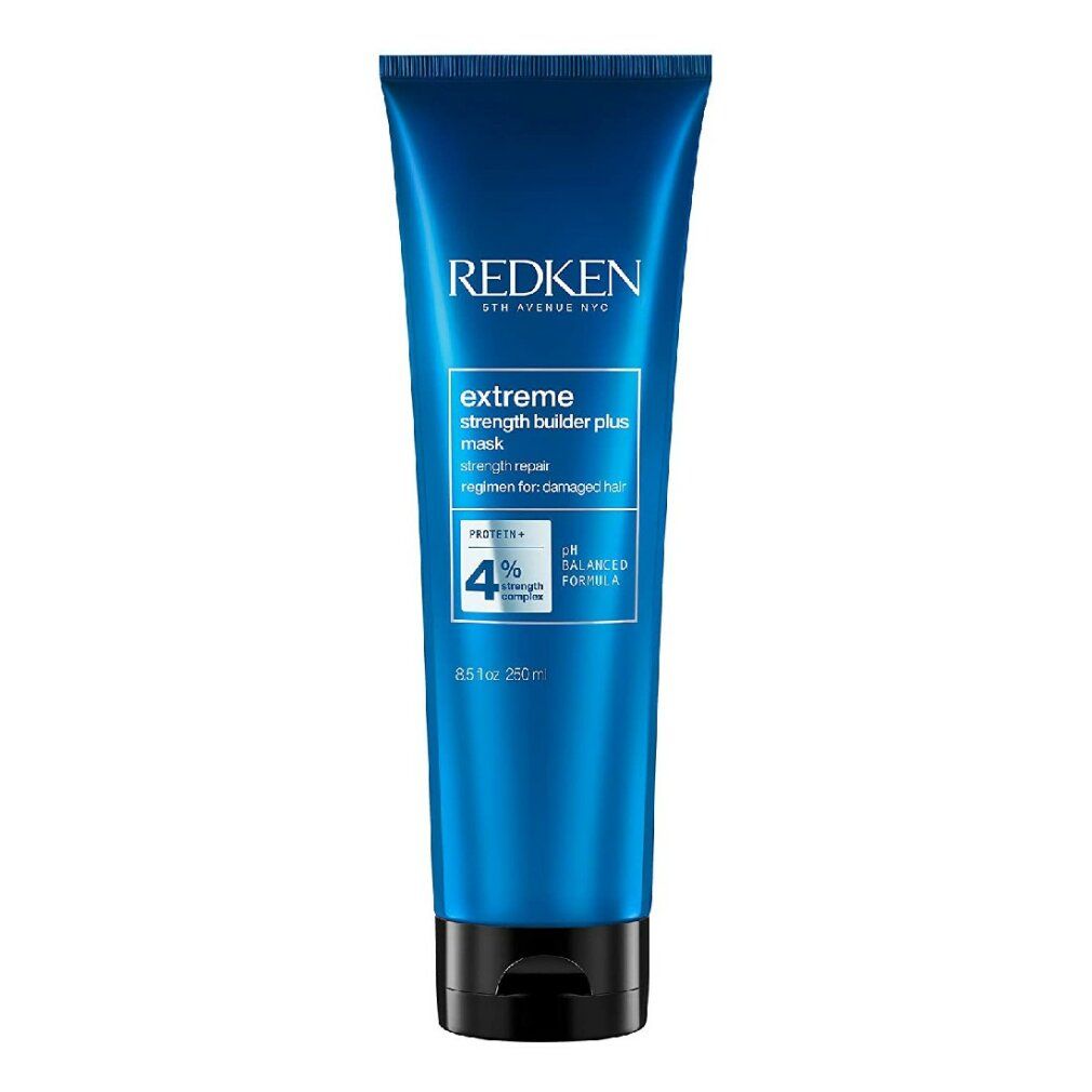 Tube bleue Redken Extreme Strength Builder Plus. Texte: extreme strength builder plus mask. 250ml. pH Balanced Formula.
