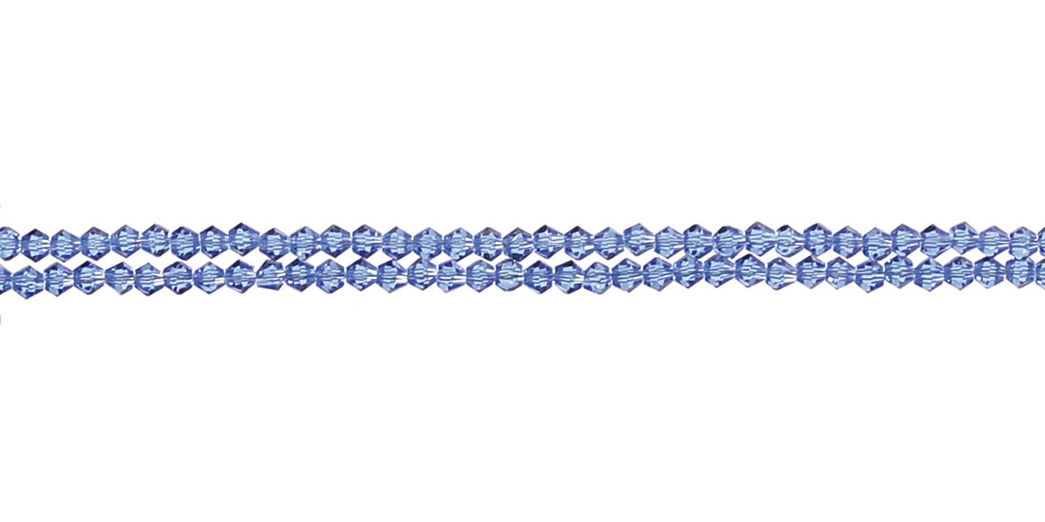 Blauw brillenkoord met kralen. Drie strengen naast elkaar. Lichte omgeving.