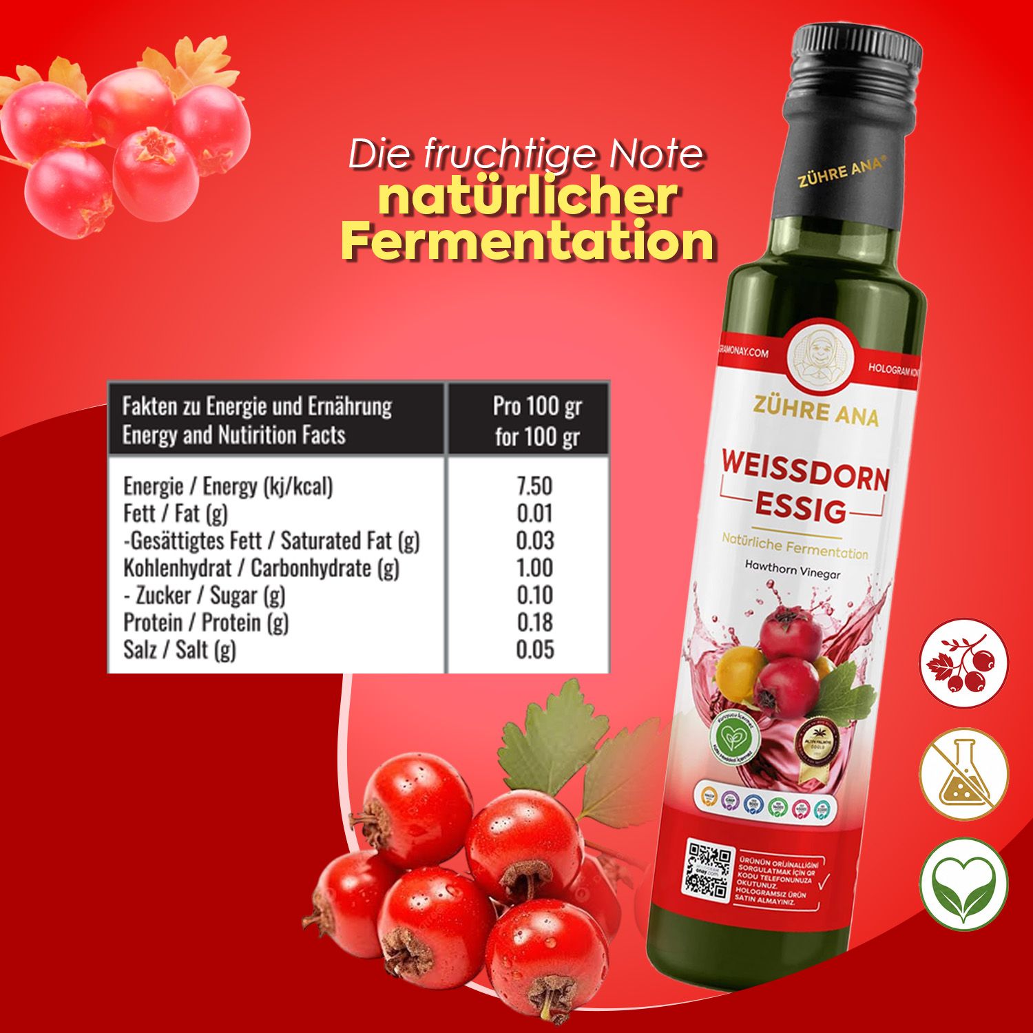 Fles meidoornazijn met etiket met voedingswaarde-informatie en fruit.