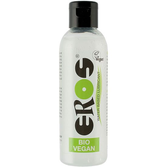 Transparante fles met zwarte dop. Opschrift EROS, groene cirkel, BIO VEGAN. Vegan-zegel.