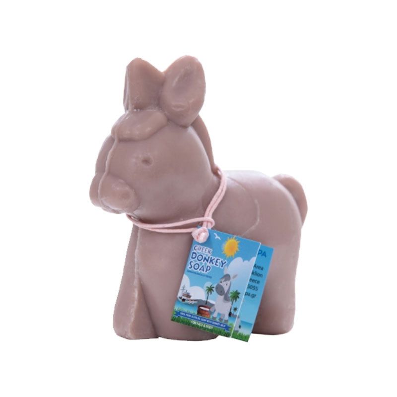 Bruine zeep in de vorm van een ezel, met een label. Op het label staat "Greek Donkey Soap".