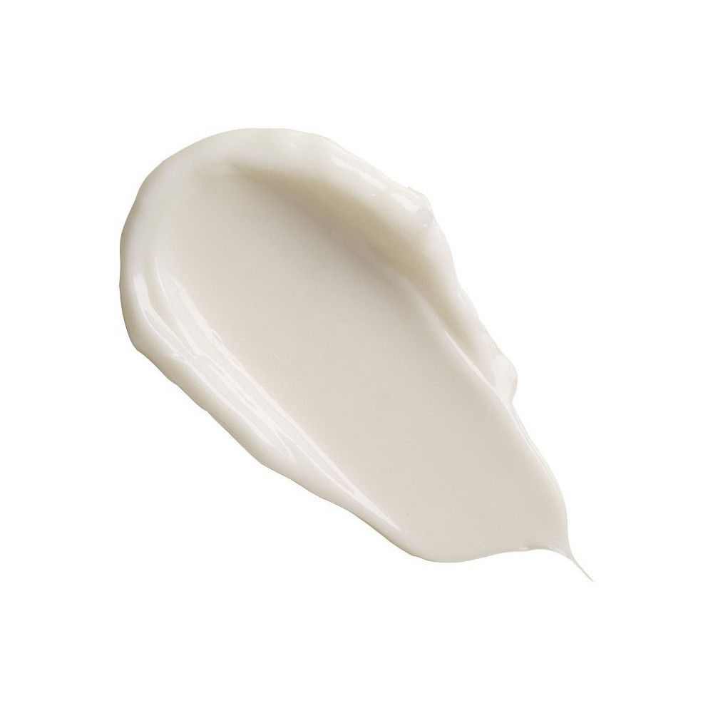 Witte crèmevlek op witte achtergrond. Langwerpige, licht gebogen vorm.