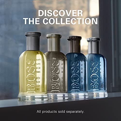 Quatre parfums Hugo Boss Bottled dans des bouteilles en verre côte à côte.